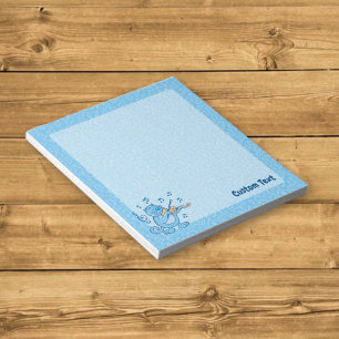 Chat bleu avec bloc-notes de violon