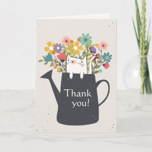 Chat dans la carte de boîte d'arrosage d'A (photo