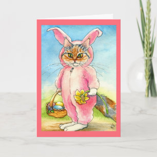 Chat dans une carte de Pâques de costume de lapin