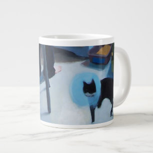 Chat de Betsy dans la tasse de cône