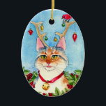 Chat de Noël avec ornement de bois de rennes<br><div class="desc">Ce mignon chaton est en plein Noël. Jolly fun ! Cette image est disponible sur les cartes de voeux,  timbres-poste et autres produits dans mon magasin Zazzle.</div>