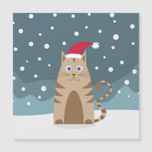 Chat de Noël portant un chapeau de santa, drôle de