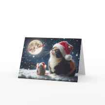 Chat et souris regardent la carte de Noël de neige