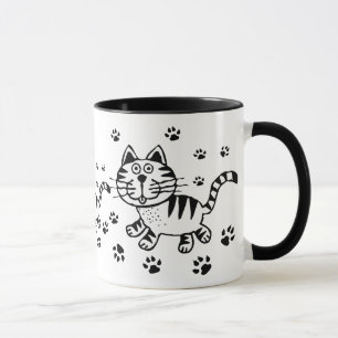 Chat et tasse mignons d'empreintes de pattes
