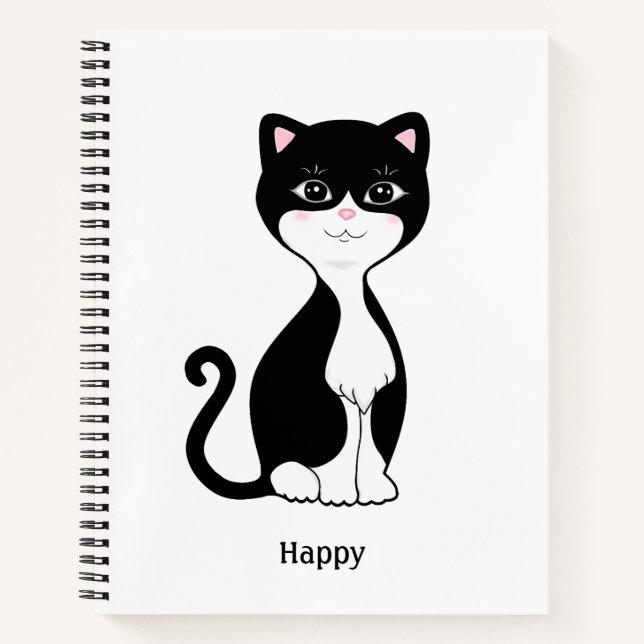 Chat mignon en smoking sur un cahier spiralé blanc (Devant)