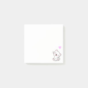 Chat mignon et cœur sur des Post-it blancs