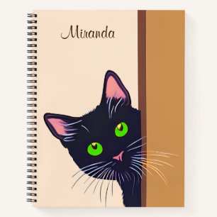 Chat noir se balade autour d'un journal de porte