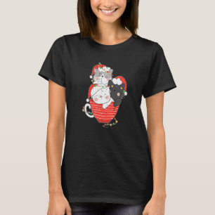 Chat s'empile sur un t-shirt de Noël de coupe de p