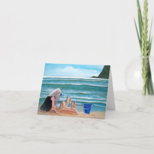 Château de sable de bâtiment de fille aux cartes