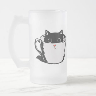 Chaton noir avec nez rouge caché dans une tasse