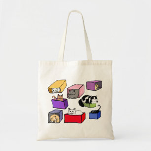 Chats dans le sac coloré de boîtes