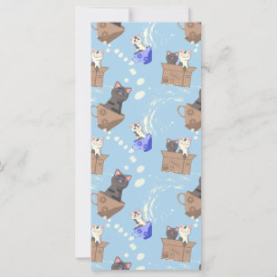 Chats en boîte et gouttes de lait sur bleu