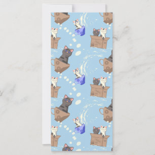 Chats en boîte et gouttes de lait sur bleu