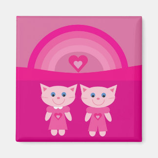Chats mignons et aimant arc-en-ciel rose