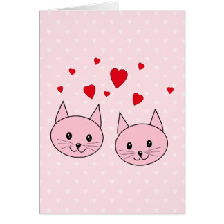 Chats roses avec des coeurs d'amour