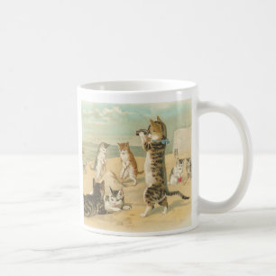 "Chats tasse vintage sur plage"