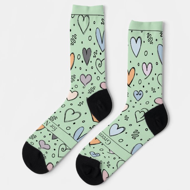 Chaussette Cœurs gribouillés sur fond vert clair avec texte (Gauche)