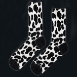 Chaussette Cuir de vache noir et blanc à motif peau de vache<br><div class="desc">Ces chaussettes amusantes à motifs ont une impression noir et blanc qui a l'apparence de la peau d'une vache. C'est parfait pour faire votre meilleure imitation d'une vache.</div>