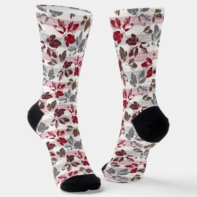 Chaussette Feuilles multicolores sur un fond rayé. (Angulaire)
