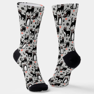 Chaussette Mignon motif sans couture de chat noir sur fond gr