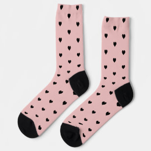 Chaussette Motif minimaliste de coeur noir sur rose pâle