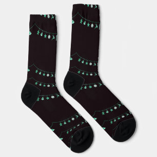 Chaussette Ornements de Noël verts suspendus sur des Chausset