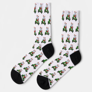 Chaussette Père Noël et Mme Claus chevauchant un scooter