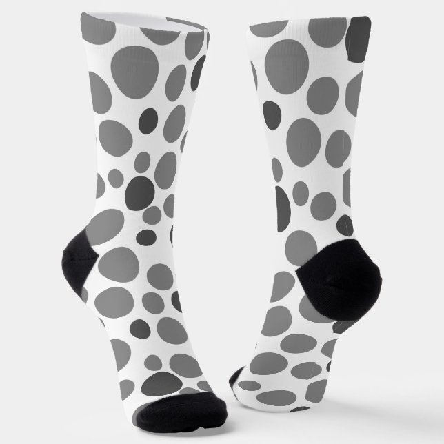 Chaussette pois gris jaune sur un arrière - plan blanc (Angulaire)
