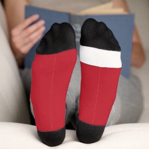 Chaussette un arrière - plan rouge avec un