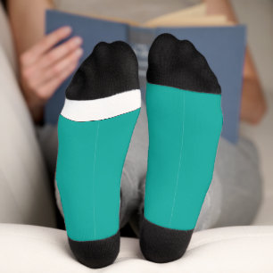 Chaussette un arrière - plan vert avec un