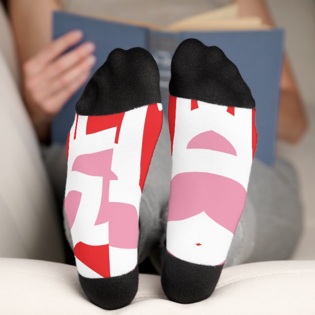Chaussette un motif rouge et blanc avec une fleur (Fond)