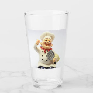 Chef riant avec flûte en verre