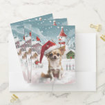 Chemise Dossier Chihuahua Winter Wonderland Christmas Joy<br><div class="desc">Ce design festif reflète l'esprit joyeux de la période des fêtes, avec un adorable petit portant un chapeau de Père Noël. Le chien est niché dans un pays des merveilles hivernales, avec un bonhomme de neige, un sapin de Noël décoré et des cadeaux joliment emballés. Les flocons de neige tombent...</div>