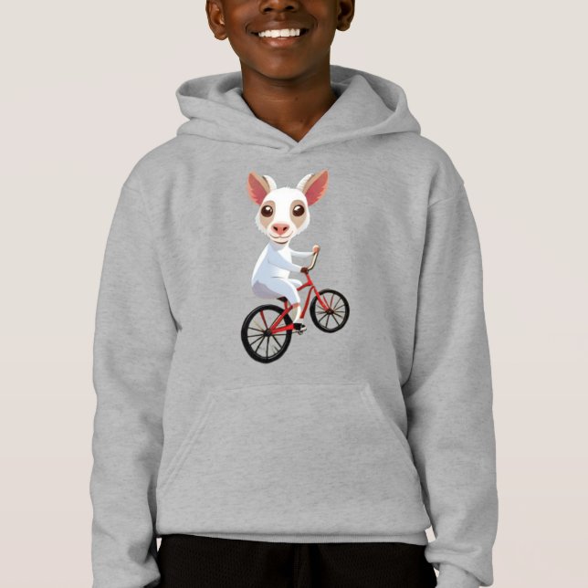 Chèvre blanche mignonne sur un vélo (Devant)