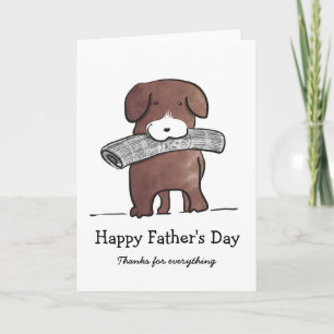 Chien avec carte de Fête des pères de journal