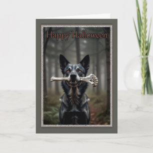 Chien avec carte d'Halloween os