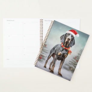 Chien Bluetick Coonhound dans la neige de Noël