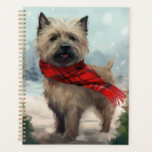 Chien Cairn Terrier dans la neige de Noël