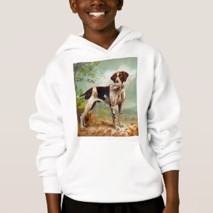 Chien de chasse avec oiseau dans la bouche