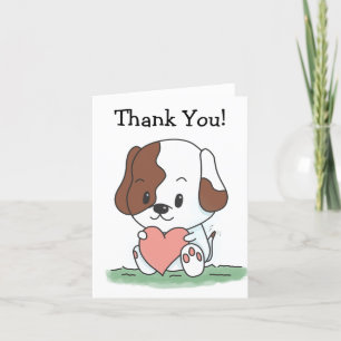 Chien de dessin animé avec un cœur merci