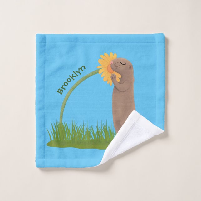 Chien de prairie mignon reniflant une fleur dans u (Gant de toilette)