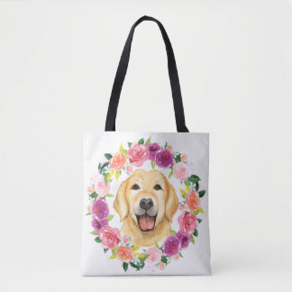 Chien jaune de laboratoire avec le sac fourre-tout