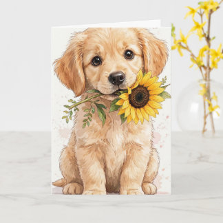 Chiot golden retriever tenant une carte de tournes
