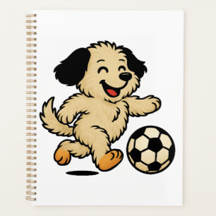 Chiot jouant au football