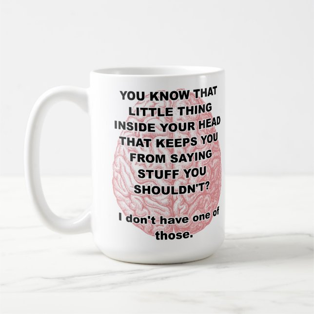 Chose à l'intérieur de la tasse (Gauche)