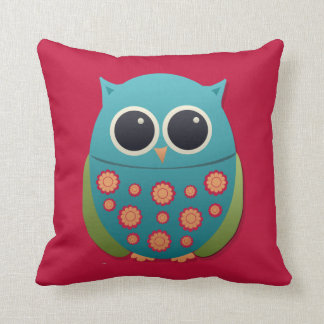 Chouette bleue et verte mignonne sur un oreiller r