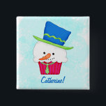 Christmas Snowman Cupcake Name Badge Personalized<br><div class="desc">Introduce yourself at meetings or events during Christmas or the winter holidays with this snowman cupcake name badge tag with a customizable name. The snowman cupcake is wearing a blue top hat with green accents and a lime green neck tie with blue dots. The cupcake paper wrap is red with...</div>