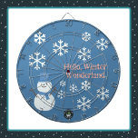 Cible De Fléchettes Bonjour, Winter Wonderland<br><div class="desc">A Slice of Life and Delight présente un tableau de bord Winter Wonderland avec un bonhomme de neige décoré de flocons de neige blancs,  d'écriture rose et d'un fond bleu. Le snowman dart board comporte également un casquette bleu et une écharpe.</div>