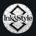 Cible De Fléchettes Ink&Style<br><div class="desc">¡Sé el primero en tenerlo! Presentamos la primera obra oficial de Ink&Style: un diseño único que combina elegancia, trazos artísticos y geometría con carácter. Esta pieza es más que un logo: es una declaración de estilo, creatividad e identidad visual. Ideal para cuadros decorativos, rompecabezas, bolsos, posters o cualquier objeto con...</div>