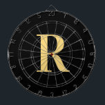 Cible De Fléchettes Monogramme moderne Noir Or<br><div class="desc">Il s'agit d'un monogramme simple, moderne et personnalisé. Ce design élégant est en noir et or tendance avec typographie stylisée. Il est parfait pour un cadeau personnalisé ou idéal comme un nouvel ajout élégant à votre équipement de salle de jeux. Ajoutez simplement votre lettre initiale en la tapant dans la...</div>